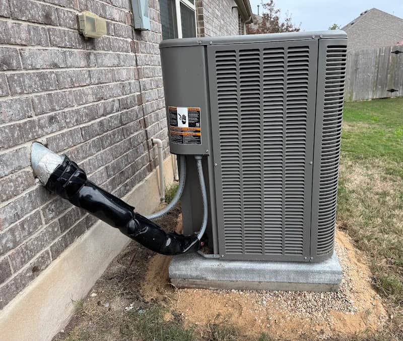 Licensed plumber performing sewer line inspection