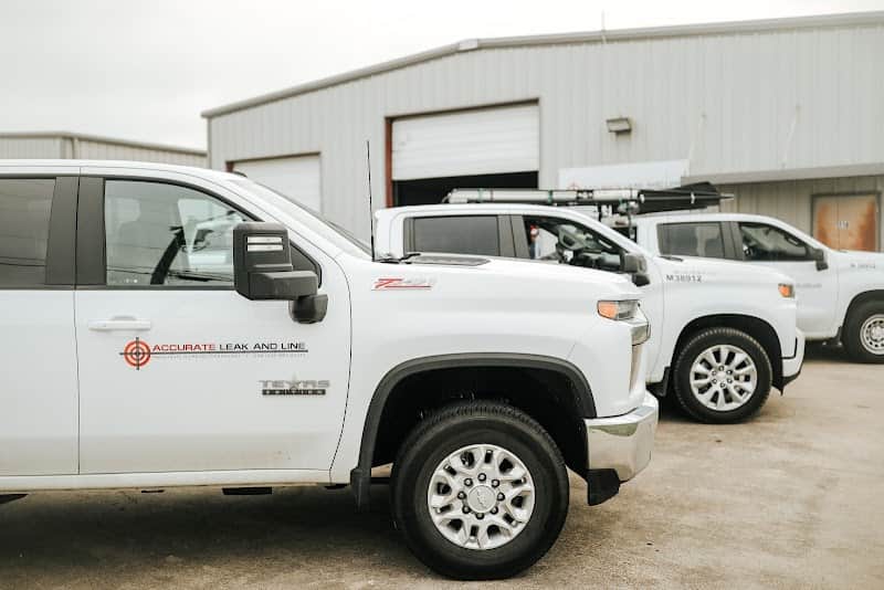 Licensed plumber performing sewer line inspection