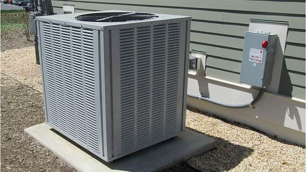 Licensed plumber performing sewer line inspection