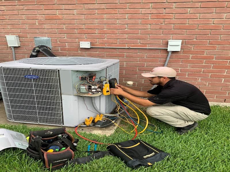 Licensed plumber performing sewer line inspection