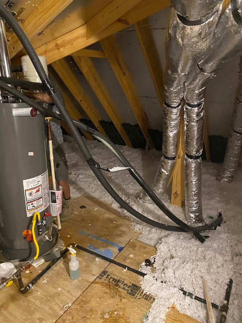 Plumbing team on residential job site