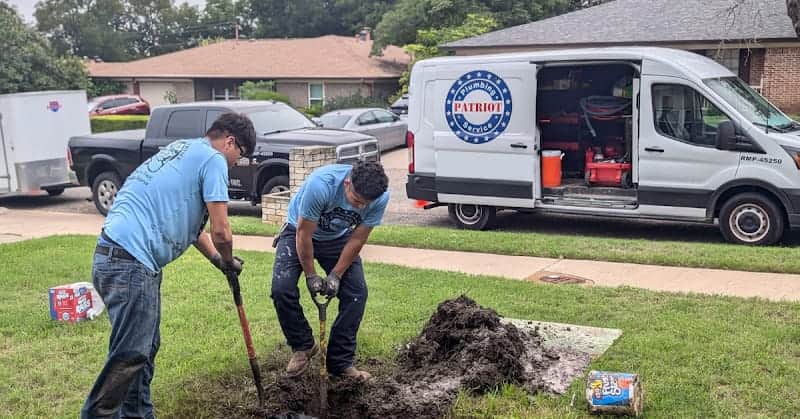Licensed plumber performing sewer line inspection