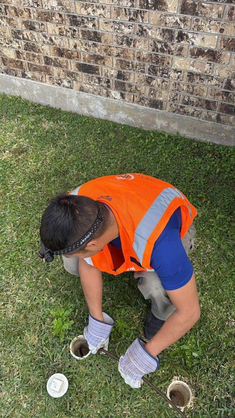 Plumbing team on residential job site