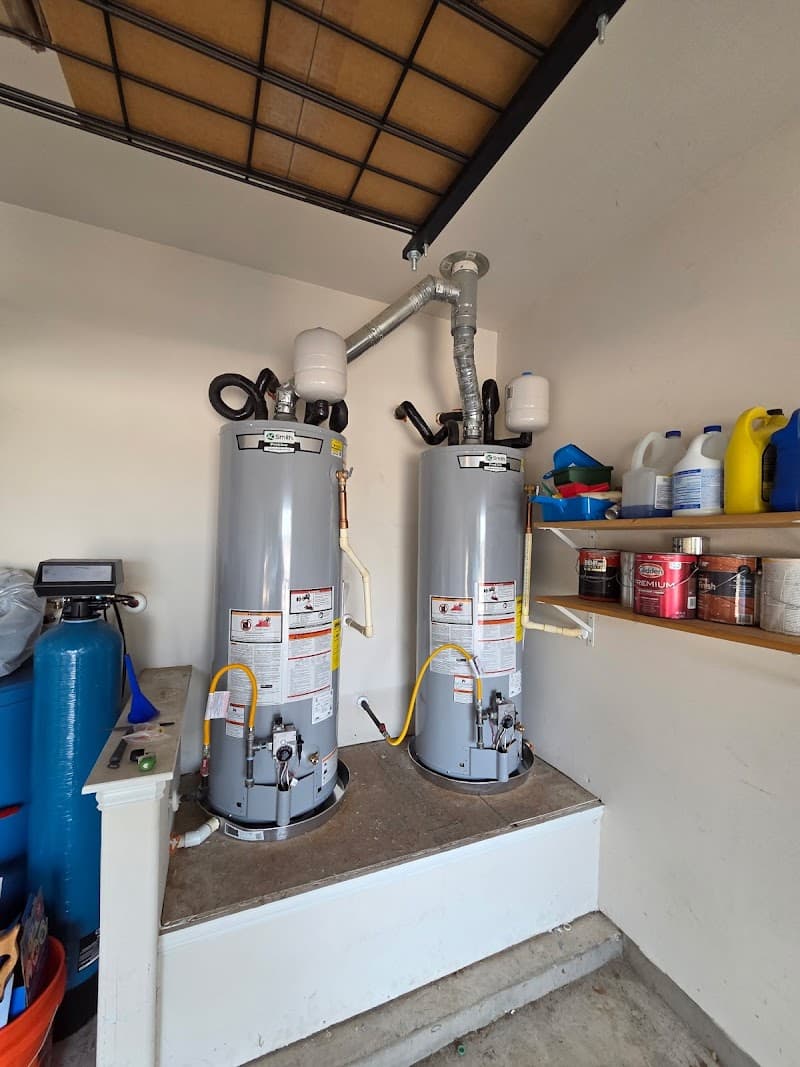 Licensed plumber performing sewer line inspection