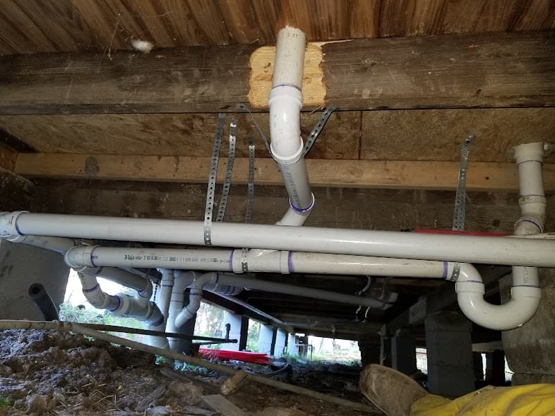 Plumbing team on residential job site