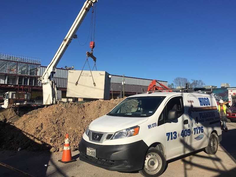 Licensed plumber performing sewer line inspection