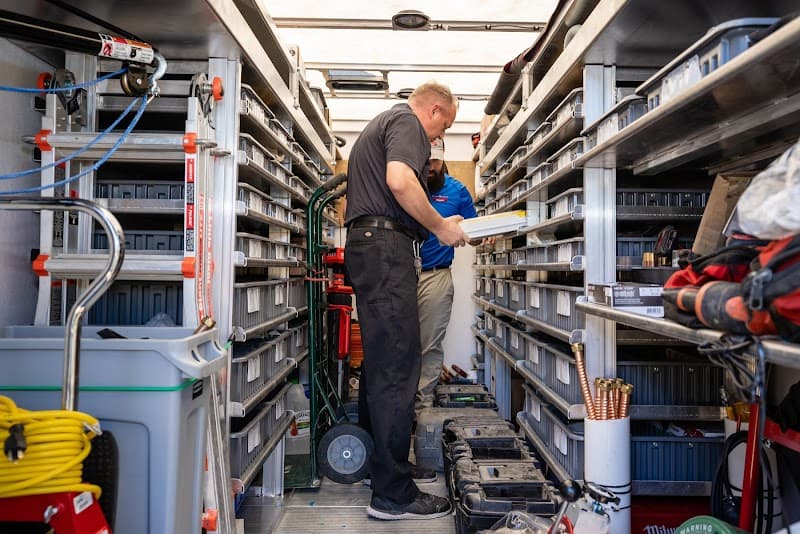 Plumbing team on residential job site