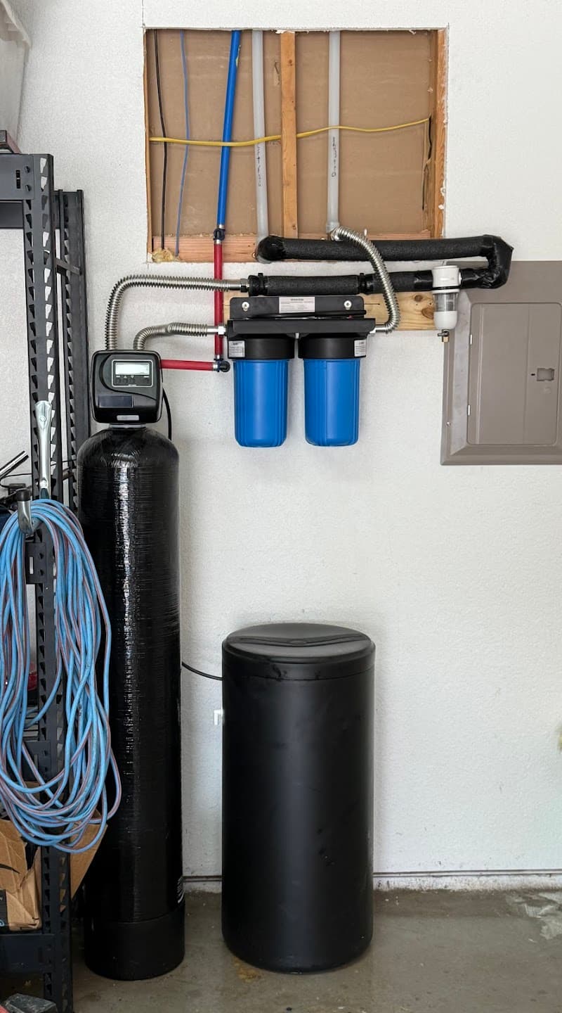 Licensed plumber performing sewer line inspection