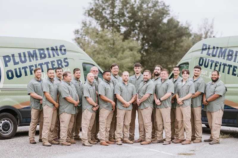 Licensed plumber performing sewer line inspection