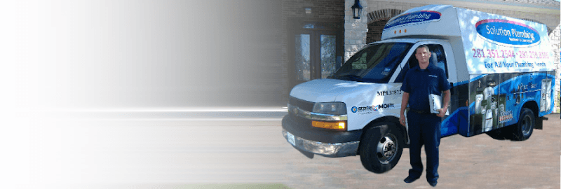 Licensed plumber performing sewer line inspection