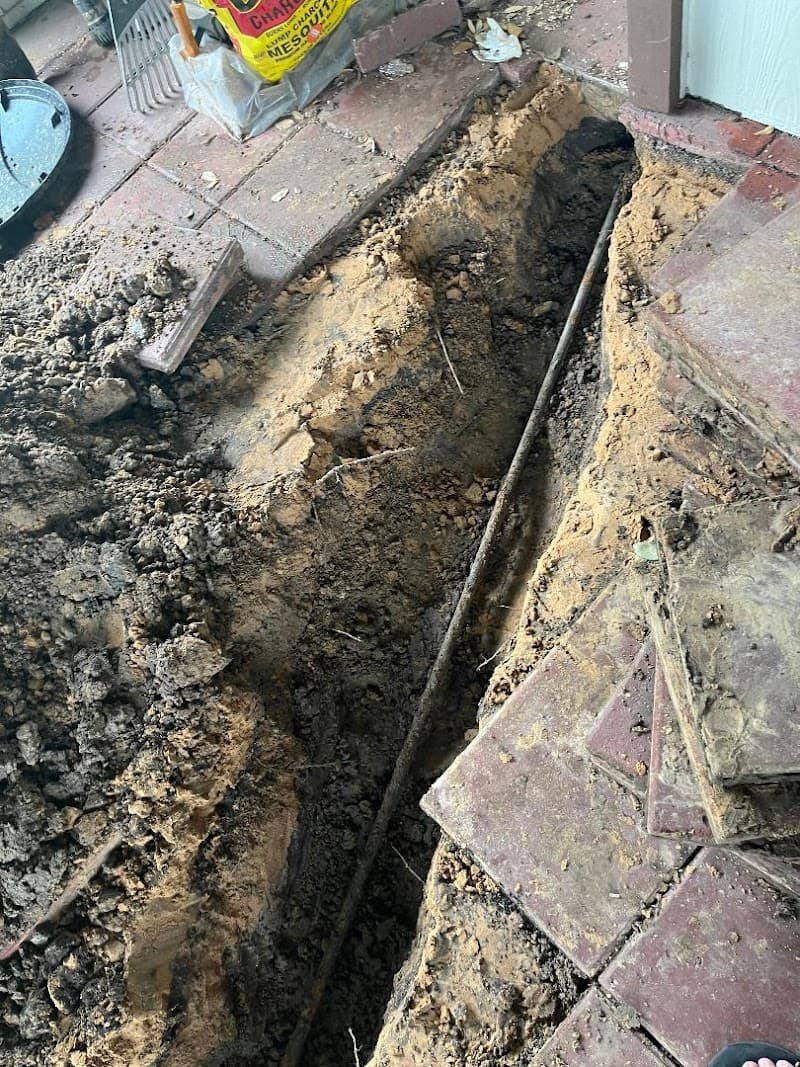 Plumbing team on residential job site